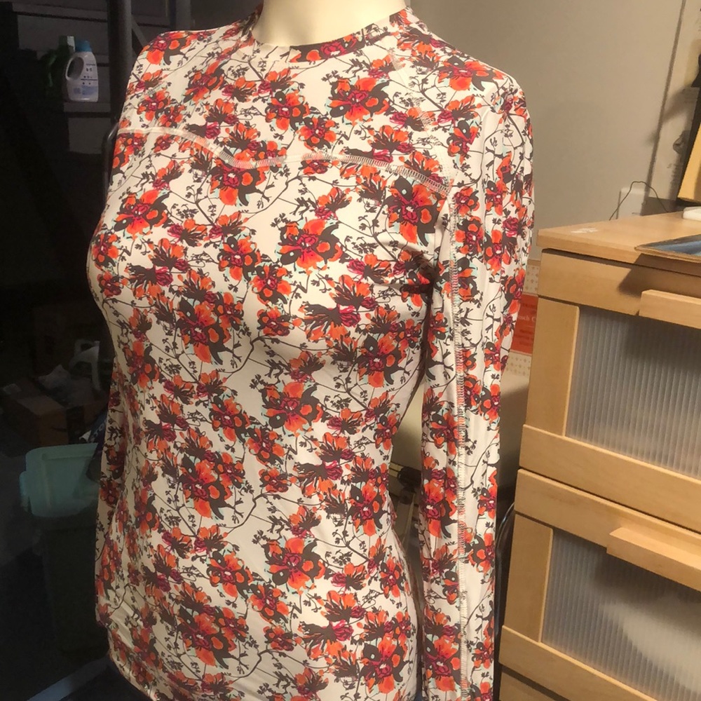 Woman’s floral printed long sleeve workout top